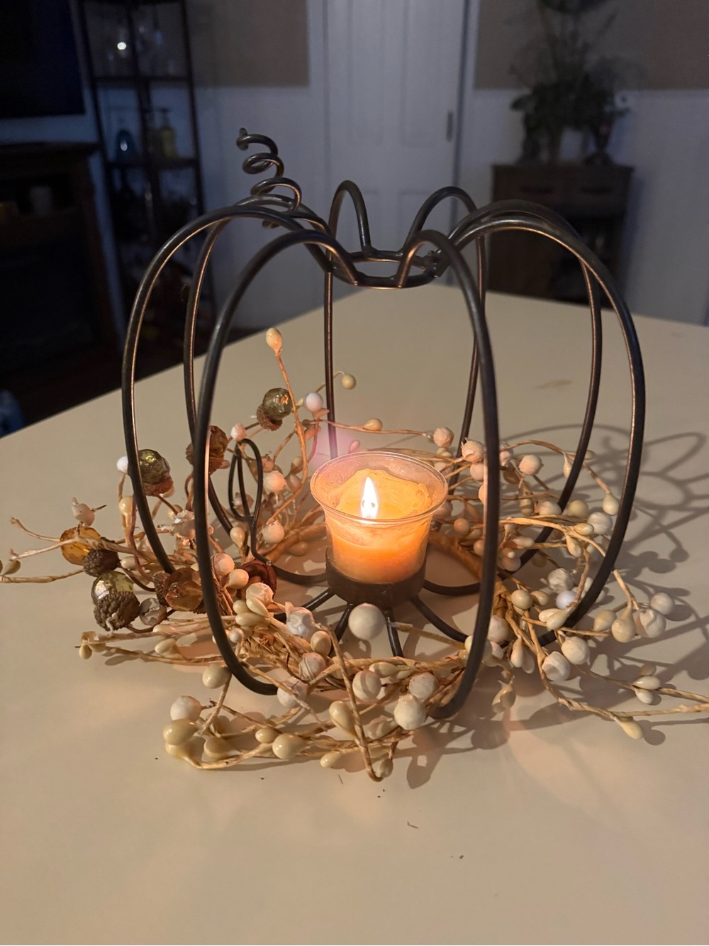 Rustic Metal Pumpkin Candle Holder with Cream Berry Garland